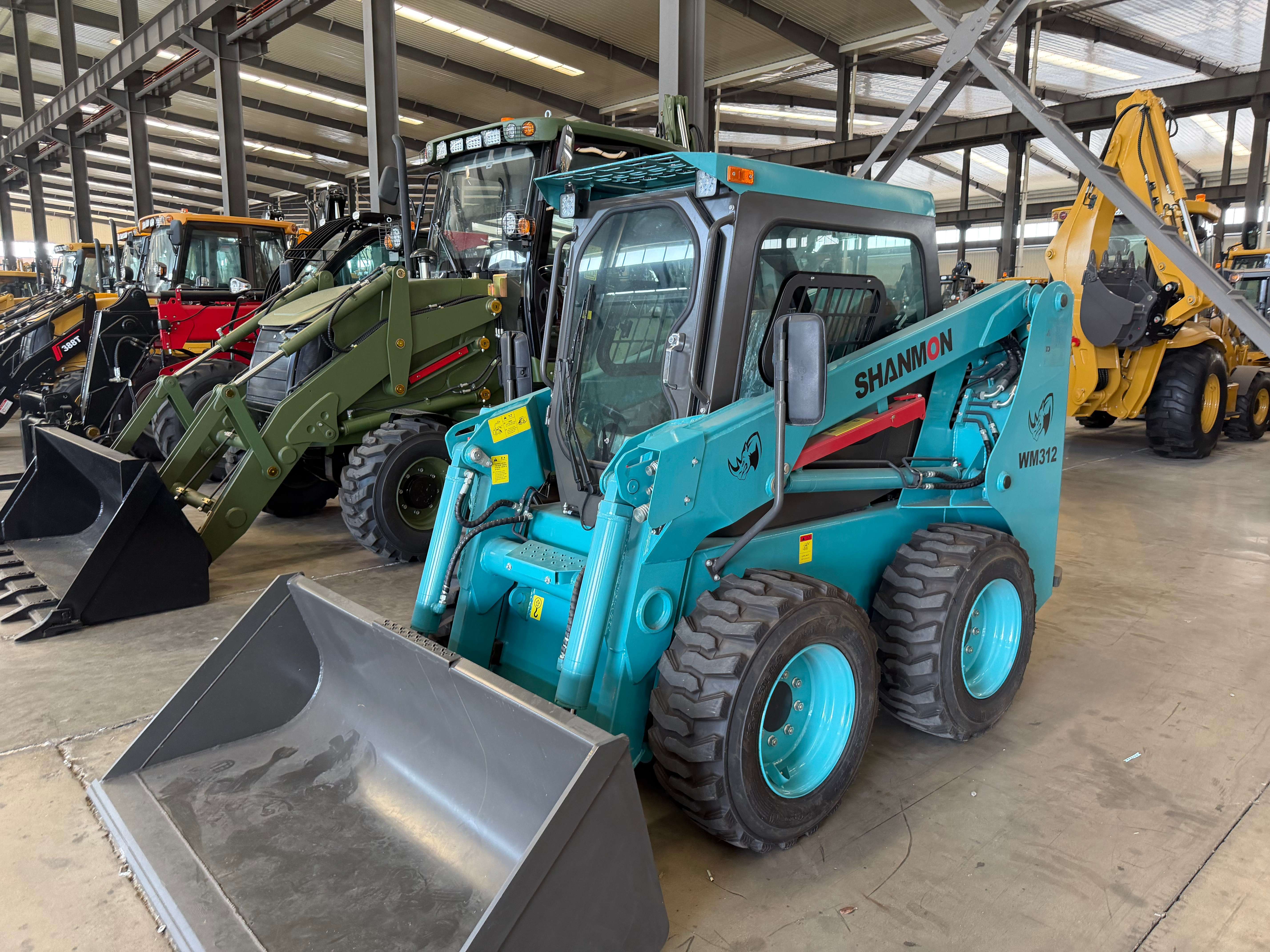 Cargadora compacta YUYAN YM312 | Mini cargadora compacta de 1200 kg | Motor Kubota y Yanmar Disponible